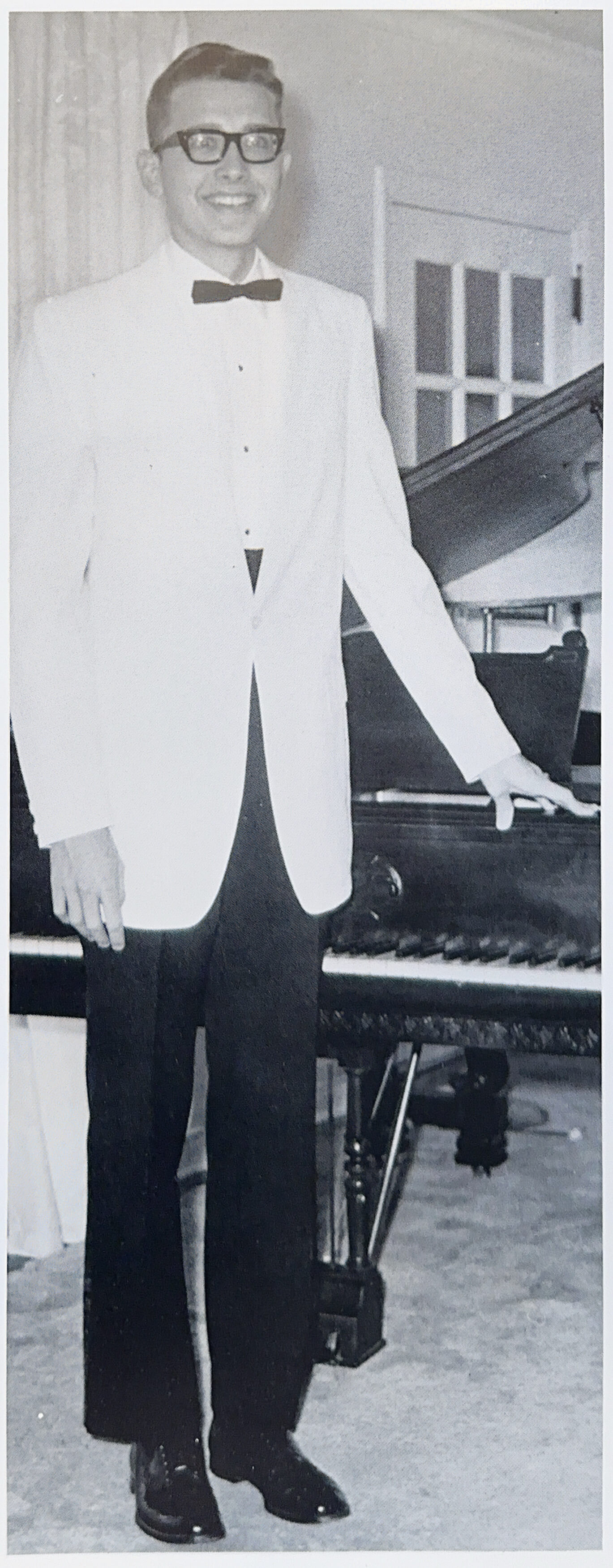 teenage Jerry Oakman with piano